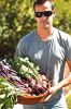 Scott Evans, owner of Pago, in his backyard garden, which currently supplies veggies for his restaurant. Photo: Barrett Doran