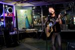 Mike C. performs during Submerged in Art benefit. Photo by Brent Rowland