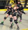 SCDG's Sisters Face Off Against the Bomber Babes. Photo: Shooter