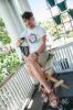 Willard sips a glass of wine on his 3rd floor balcony, facing into downtown SLC. Photo: Paul Duane