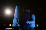 Couple Michael Ferguson and Seth Anderson cut the massive wedding cake in front of the crowd at Love Elevated. Photo: Logan Sorenson LmSorenson.net