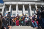 Tom Bennet performing “Governor We Cannot Breathe.” Photo: Garrett Allen Photography