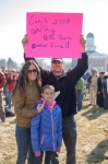 Laurie, who carpooled in her good friend’s Toyota Prius, rallies with her brother and niece.  Photo: Garrett Allen Photography