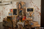 "Ithaka 12" is an installation of illuminated cardboard dioramas, found objects and paintings. Photo: John Barkiple