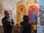 Willy Palomo and Rosie Glade admire "Butterfly Project." Palomo works with Jorge Rojas in a clemente course at East High School in conjunction with Westminster College. Photo: John Barkiple