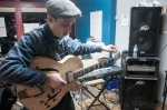 Sam Burton, vocalist for The Circulars, setting his guitar in tune. Photo: Martín Rivero