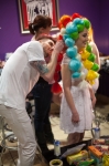 Model Alex McCoy is helping Megan Golden with her elaborate hair of Serah Shirley’s design. Photo: Garrett Allen