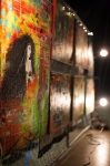 Artists' work, for the most part, was displayed on various sections of chainlink fence that were placed all through the event, such as the intricate and colorful work of artist Rocky Fresh.  Photo: Garrett Allen