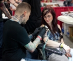 Steve Tippetts from Anchor Ink in SLC puts in work on Alisha Reed. Photo: www.matthewwindsorphoto.com