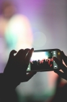 Fans were taking photos and video throughout sets, there were at least 3-4 smart phones out at any given moment. Photo: Garrett Allen