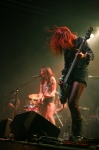 Red hair goes wild as Anissa of Eyes Set to Kill thrashes on her bass. Photo: Garrett Allen