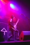 Bassist Emma Anzai of Sick Puppies goes crazy on the stage, jumping, thrashing and dancing while pounding out technical bass lines. Photo: Garrett Allen