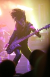 Bassist Emma Anzai of Sick Puppies jumps around on stage more than anyone I have seen, save Flea from the Red Hot Chili Peppers.  Photo: Garrett Allen
