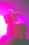 Cristina Scabbia of Lacuna Coil cradles the microphone and sings from her heart in her lace dress and patent leather boots. Photo: Garrett Allen