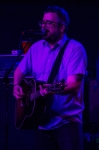 Jon Snodgrass of Drag the River is dimly lit by the pink and blue ambient lights as was standard for most bands on Friday night. Photo: Talyn Sherer