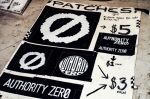 Authority Zero patches adorn the merch table waiting to find their way onto their punk rock human hosts. Photo: Talyn Sherer
