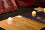Golden, Yellow Ostrich eggs lay strewn about the merch table, enticing customers. Photo by: Logan Sorenson / LmSorenson.net