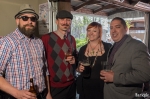 (L – R) Bunny Hop DJ Jesse Stewart and French Villain David Ruiz join Michele and Chris Sanchez for drinks before Stewart begins his set. Ruiz arrived on a blue Stella scooter and had an easy time parking at the usually crowded Garage. Photo by John Barkiple.