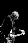 Pat Boyers tuning his guitar for the next song. Photo: Gilbert Cisneros