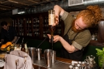 Zade Womack pours some High West Rye Whiskey while preparing the signature cocktail of the night, "The Rest Easy." Photo: Talyn Sherer