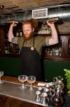 Zade Womack performs like a true professional, shaking the ingredients together to finish off The Rest Easy cocktail. Photo: Talyn Sherer