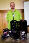 Jerry Glaser posing with the budget computer from his "PC Gaming Is Not As Expensive As You Think It Is" sponsored by Revo Technologies. Photo: Matt Brunk (unlifephotography.com)