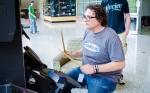 Chris Rager calmly tapping away at the Drum Mania machine. Not enough explosions!! Photo: Matt Brunk (unlifephotography.com)
