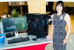 Devin Zbinden of Stevens-Henager College showing off the technology program's tricked-out PC. Photo: Matt Brunk (unlifephotography.com)