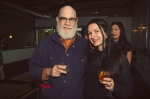 (L-R) Glen Warchol of Salt Lake Magazine and Angela Brown of SLUG socialize over some drinks and share insights about their respective work. Photo: Talyn Sherer