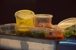 Various toppings and ingredients rest in buckets by the prep station—prompting the inquisitive mind to wonder about their eventual dishes. Photo: Talyn Sherer