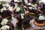 The exclusive Tostaditos con Chamorro Negro from Frida Bistro made the V.I.P. lounge well worth the extra cost. Photo: Talyn Sherer