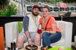 (L-R) Ryon Ellinson and Taryn Katter grab a seat in the V.I.P. lounge and enjoy some great samples from surrounding booths. Photo: Talyn Sherer