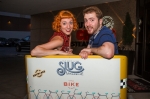(L-R) Best friends Camille Evans and Matt Gray jump into the back of the cycle cab for a quick photo. Photo: Talyn Sherer