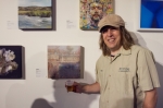Chris Haas of Desert Edge Brewery shows off his beer pairing next to the assigned art piece. Photo: Talyn Sherer