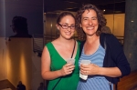 (L-R) Alexandra Yost and Maureen Condic pose for a photo while getting the birds eye view of the do it exhibit downstairs. Photo: Talyn Sherer