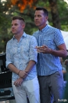 Tyler and Michael enjoy delicious appetizers as they listen to acceptance speeches during the Grand Marshal Reception. Photo by John Barkiple.