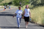 Erica and Corey from Mormons Building Bridges enjoy their walk through City Creek Canyon during the Pride 5k. “We are the very last,” Corey said. Photo by John Barkiple.