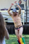 Cher from Wasatch Roller Derby rocks fur boots and a Speedo.  Photo by John Barkiple.