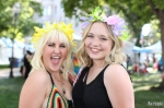 Shayna and Maddie just purchased flower garlands at the Carol’s Crafty Corner booth. Photo by John Barkiple.