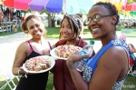 Amber shares Navajo tacos with her niece Anna and sister Sylvia. Photo by John Barkiple.