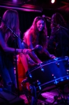 Kassandra Ryan and Alex Colledge both light up as they provide the thumping bass on a rarely seen on-stage orchestral bass drum. Photo: Garrett Allen