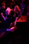 Brooks Hall continues to shred his high intensity guitar playing even while hanging his head off the stage and laying on his back, much to the crowd’s approval. Photo: Garrett Allen