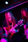 Spenny Relyea run over to growl at the camera while Jon Butler, seemingly lost in his music, continues to lay down some brilliant guitar riffs.   Photo: Garrett Allen