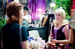 A fairy shopkeeper explains her wares to a con-goer at the Dragonfyre Apothecary booth. All-natural skin-care with a fantasy theme! Photo: Matt Brunk