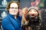 Toby Froud, son of the designers behind The Dark Crystal and Labyrinth, poses proudly with his own puppet design: Digby the puppet—featured in Froud's new short film, Lessons Learned! Photo: Matt Brunk