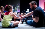 Mark Sheppard greeting a fan sitting next to the stage during his extremely interactive and fan-friendly panel. Photo: Matt Brunk