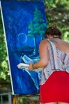 Selena Zontos takes to the stage to create a one of a kind piece of art. Photo: Talyn Sherer
