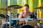 Drummer Taylor Boatwright of Through the Roots seems to have lost his shirt, due to the scorching hot sun. Photo: Talyn Sherer