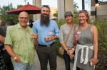 (L–R) Steven Rosenburg, Chris Weed, both on the Craft Lake City advisory board, Marsha Merrill and friend are all sharing a cocktail and enjoying the weather as it cools off for the evening. Photo: Garrett Allen