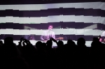More and more visible by the second, OK Go plays through an optical illision pattern of intermixing waves and bars. Photo: Logan Sorenson / LMSorenson.net